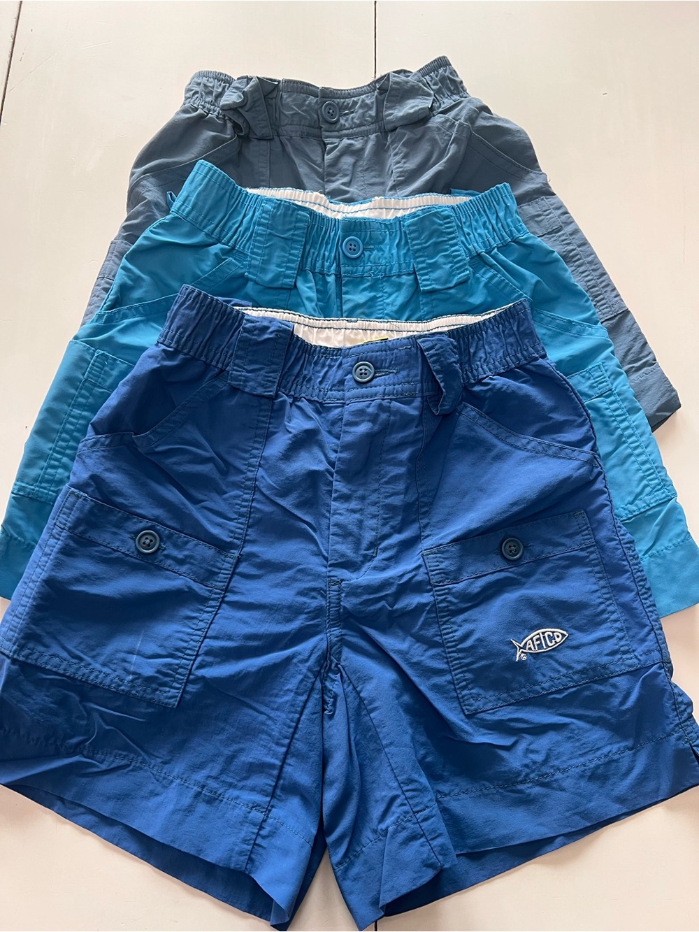 AFTCO Boys 3-Pack Cargo Shorts in Royal, Teal, and Slate Blue